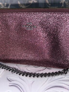 Coach Large Wristlet  Metallic Cherry (style number F64591). Nolita collection
